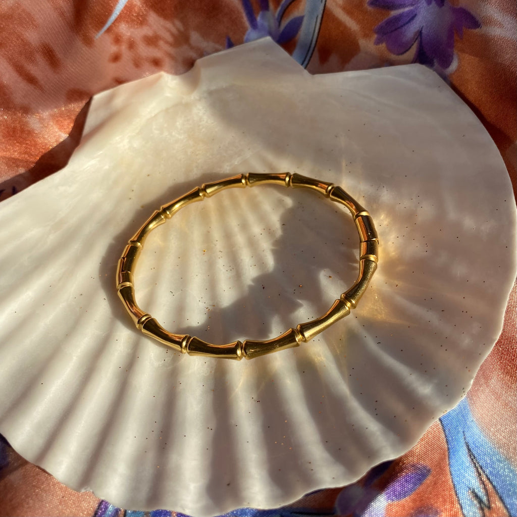 bamboo shaped gold bangle bracelet.