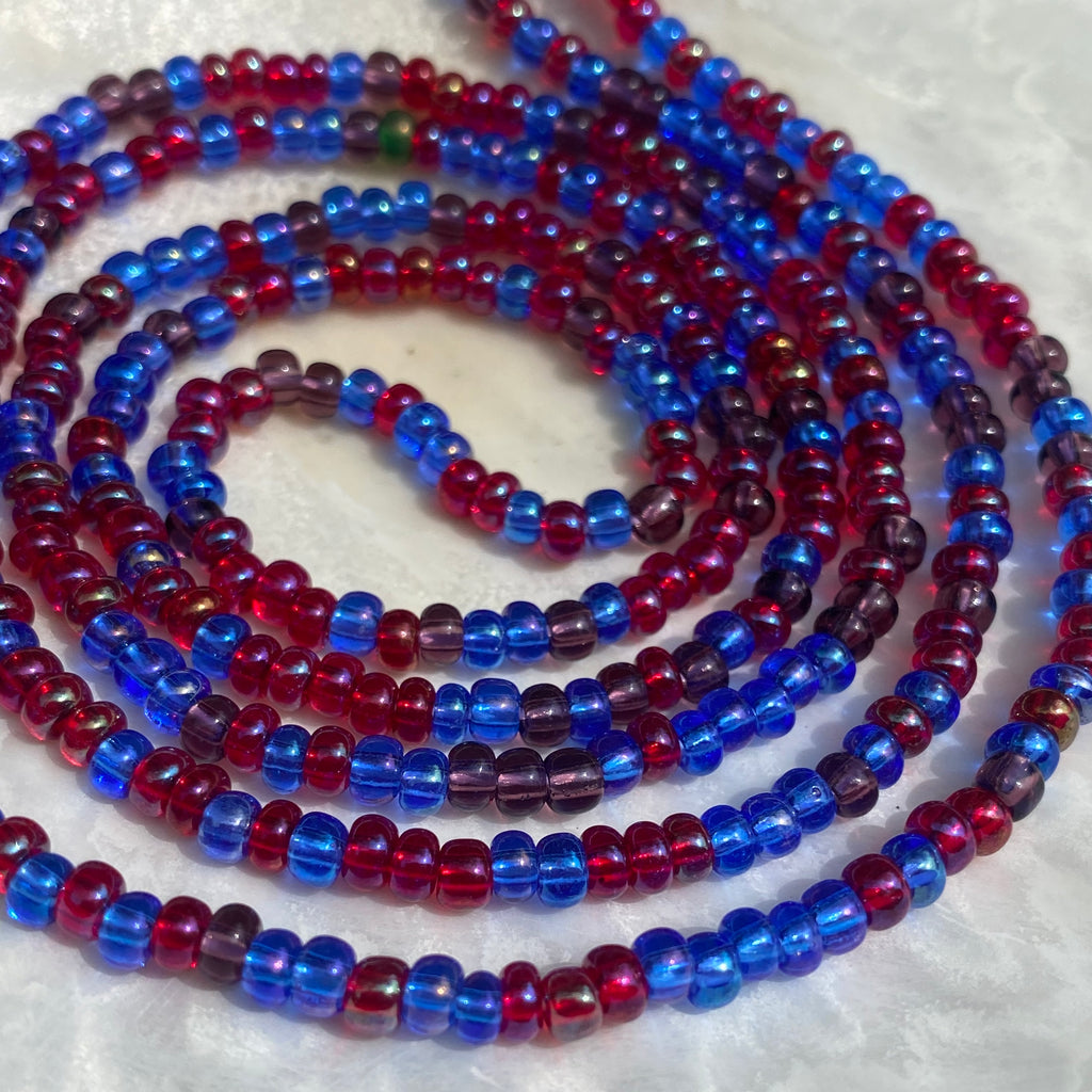 blue red and purple waist beads. 